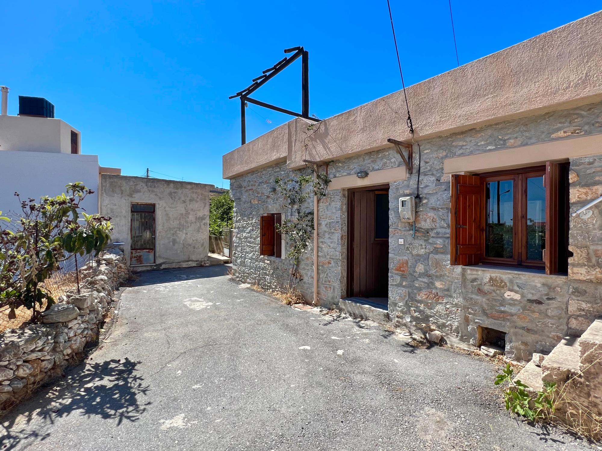 Cozy village stone house with roof terrace. Fully furnished.
