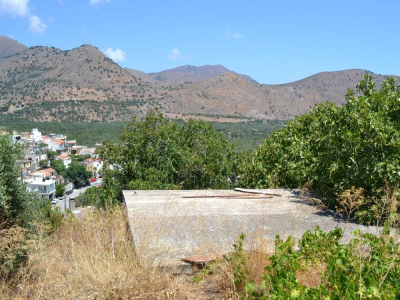 Village property containing 3 old houses with views and gardens on 488sq meters of land