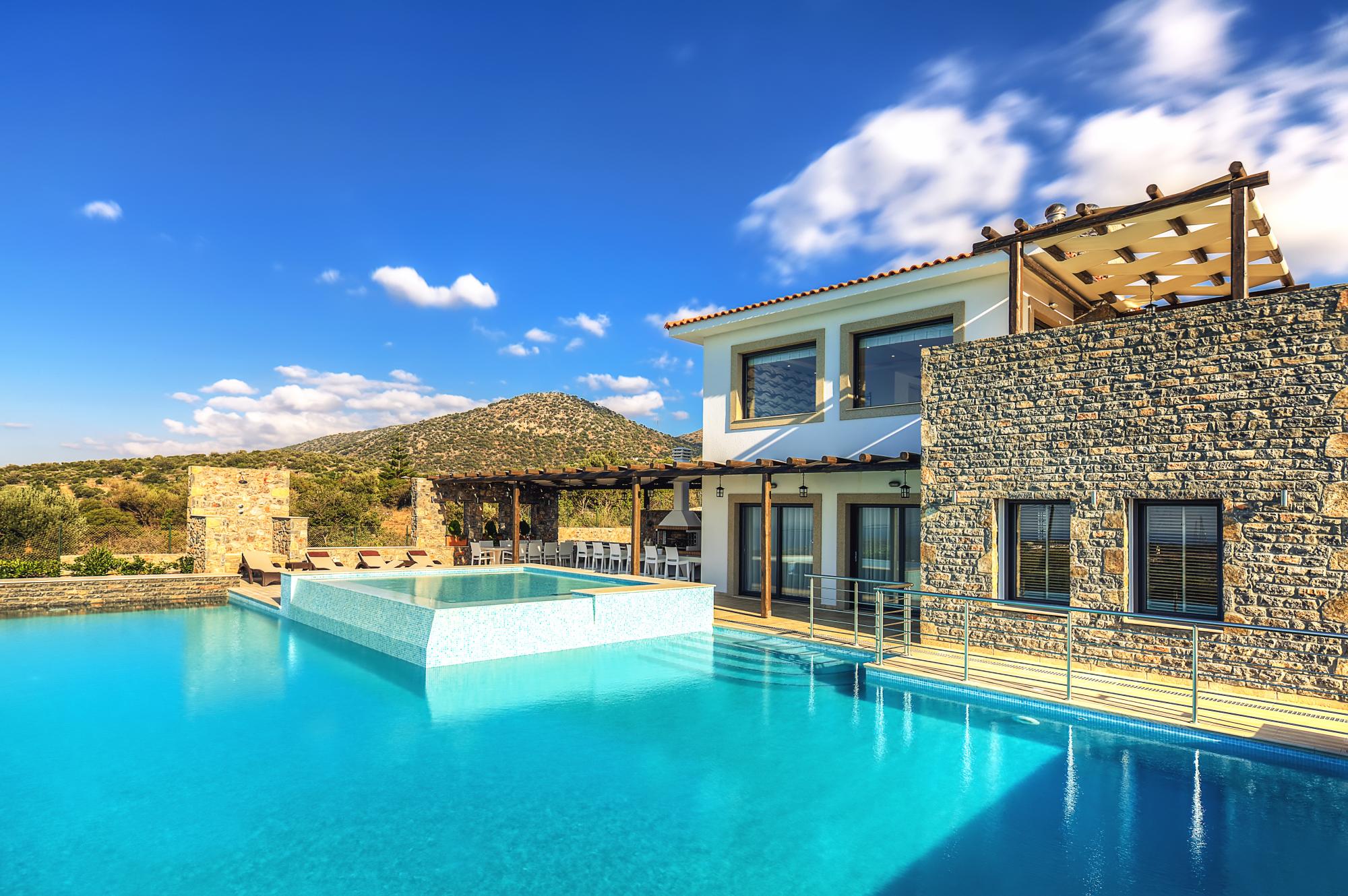 Elegant 6 bedroom villa with huge pool, lovely gardens and fantastic views.