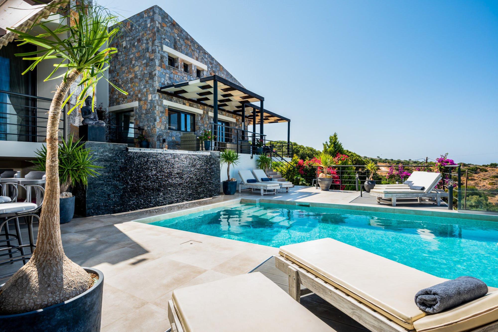 Stone-built modern villa with swimming pool and stunning views.