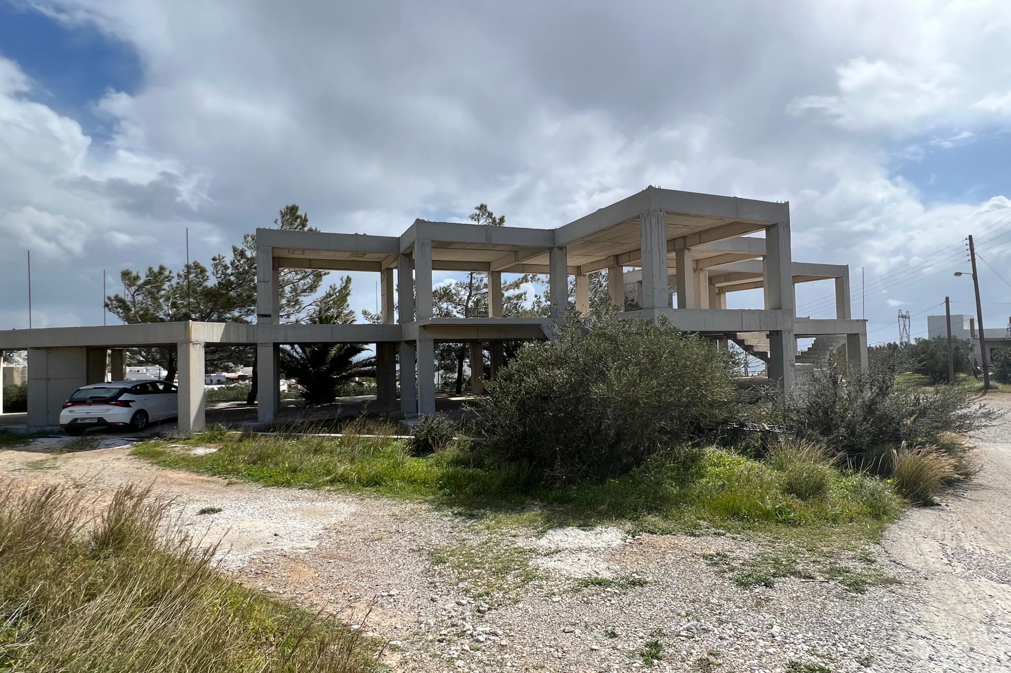 Concrete skeleton in seaside village, close to Ierapetra