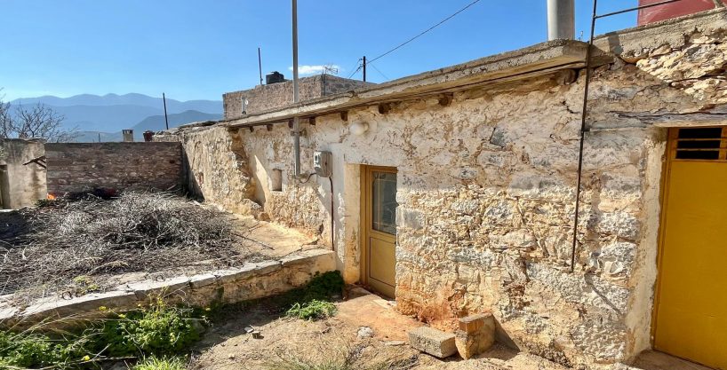 Pretty house for renovation with sea views from large roof terrace.